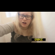 A plump, blonde, British girl with glasses takes a shit and makes straining faces at the camera, with a close between-the-legs shot. Presented in 720P HD. About 2 minutes.